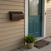 Dark Patina Mailbox on House Siding