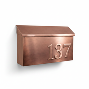Handmade brushed copper mailbox clean studio shot on white background