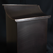 Dark patina vertical copper mailbox close-up detail