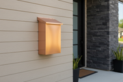 Vertical Brushed Copper Mailbox on Suburban House