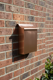 Vertical Copper Mailbox on Brick